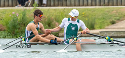 Athletes rowing WinTech Racing boat